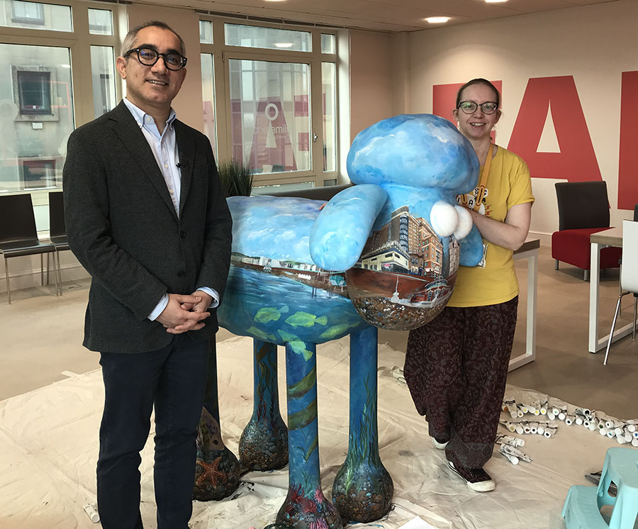 OneFamily CEO Jim Islam with artist Danni Smith and Pebble, our custom Shaun the Sheep