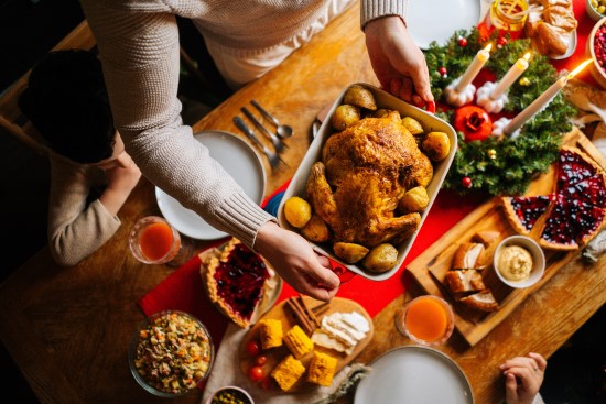 Table set for Christmas dinner viewed from above